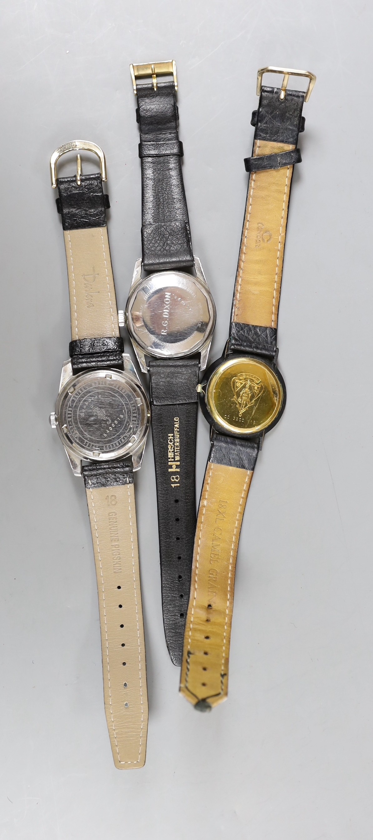A gentleman's steel Le Chamois wrist watch, a gentleman's gold plated Gucci wrist watch and a gentleman's steel Seahorse wrist watch.